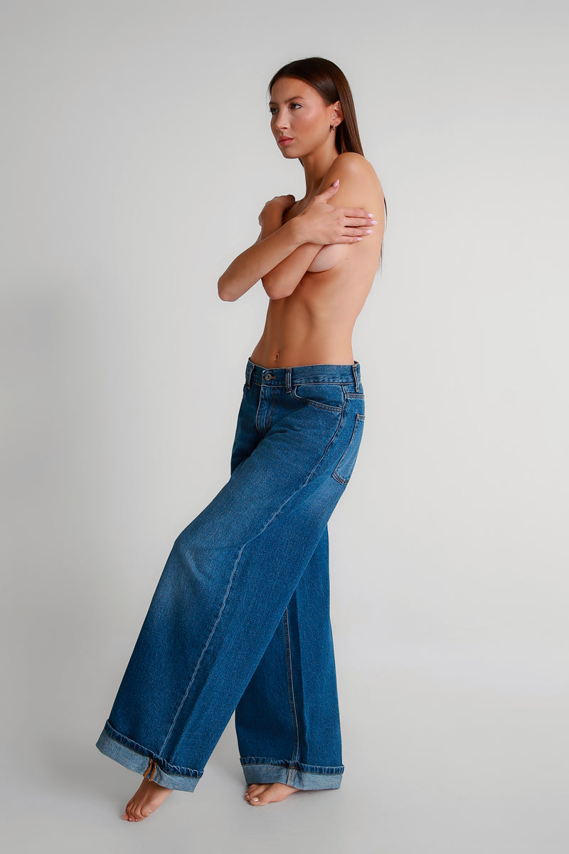 Jeans palazzo blu con risvolto