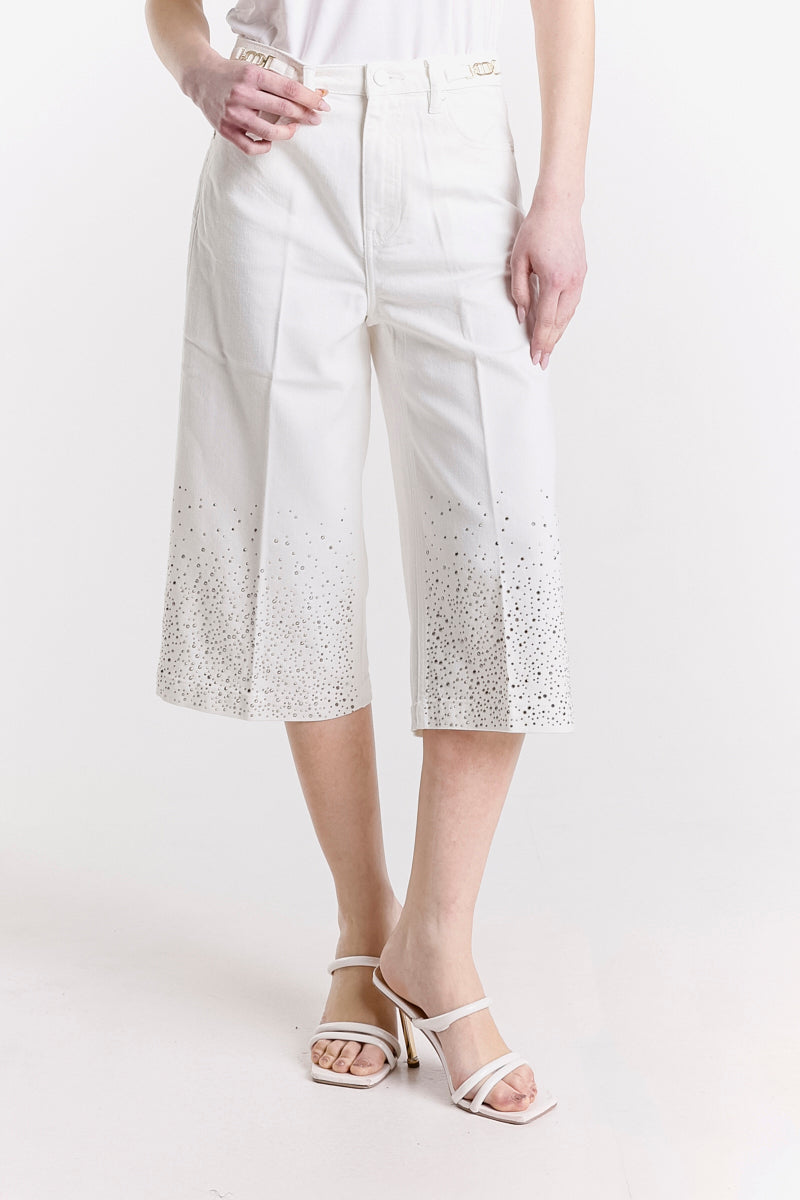 PANTALONE CROP CON BORCHIE