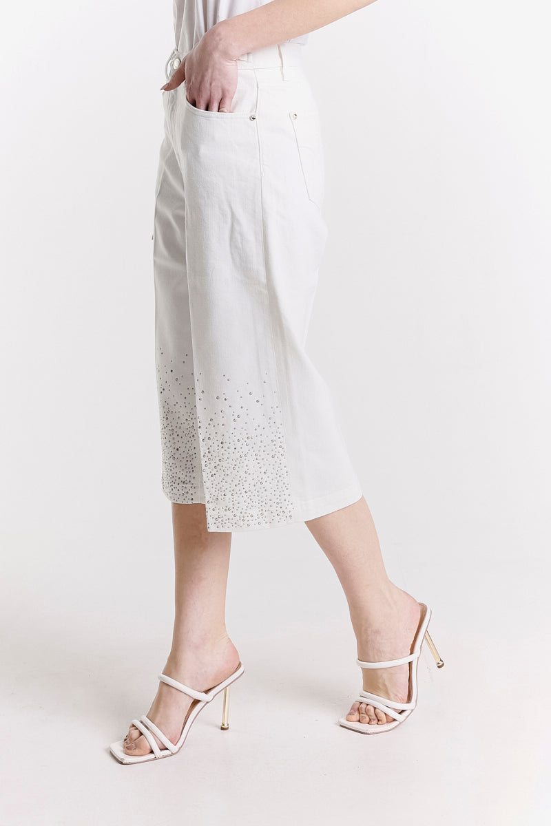 PANTALONE CROP CON BORCHIE