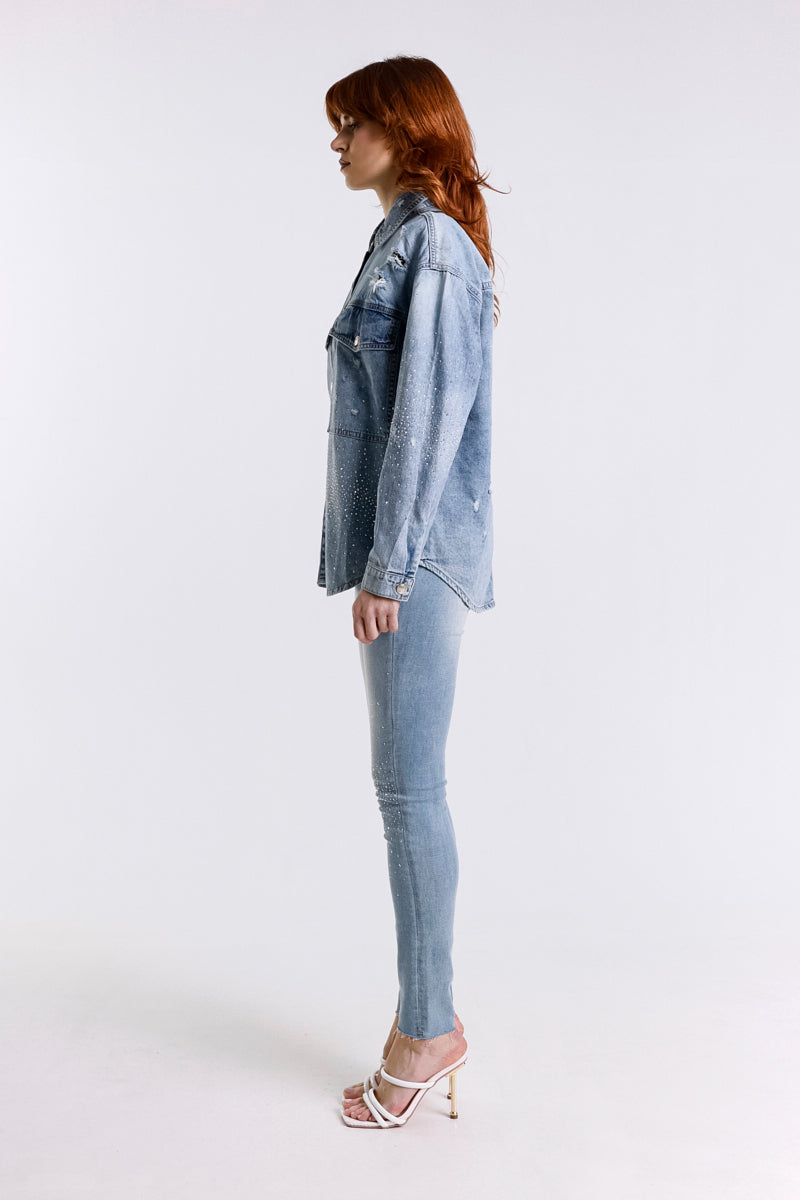 JEANS SKINNY CON BORCHIE ARGENTO