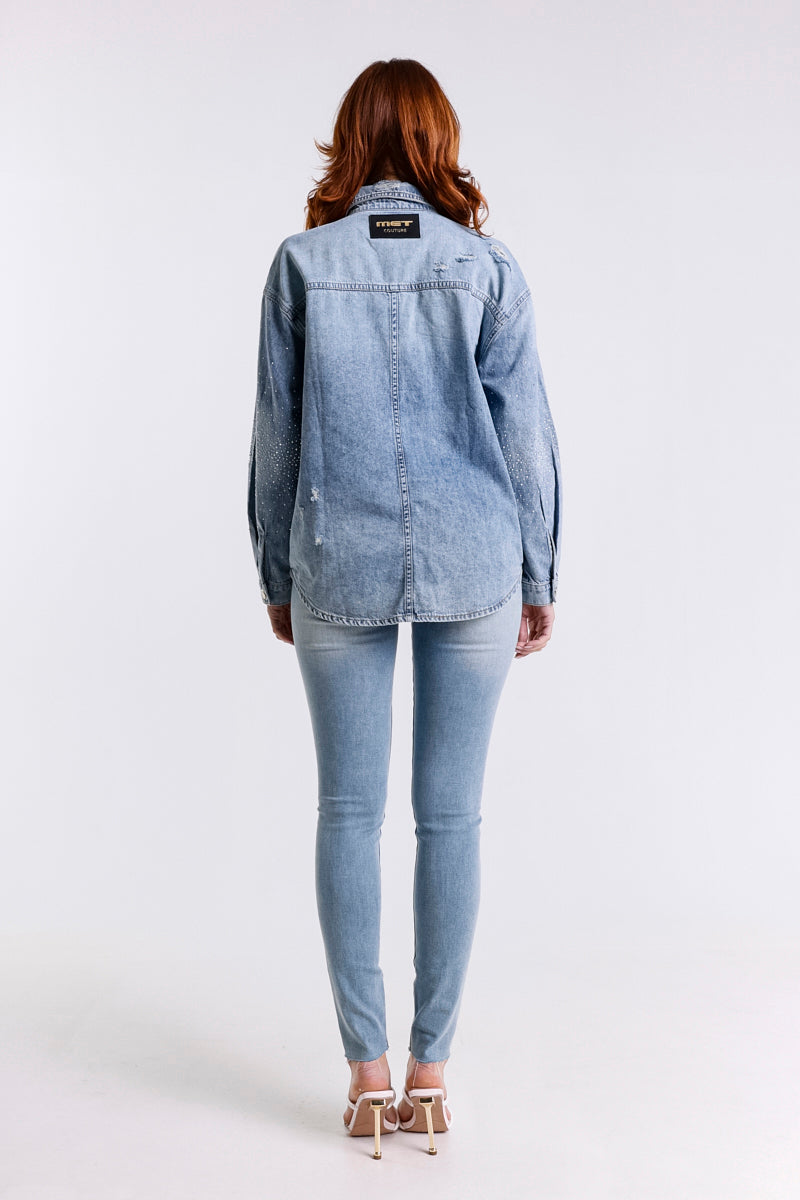 JEANS SKINNY CON BORCHIE ARGENTO
