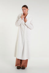 Long white coat with a large shawl collar
