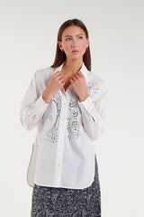 White shirt with jewel embellishments