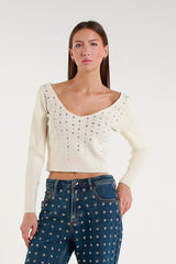 Ivory crop top with V-neck and jewel embellishments