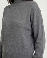 Maglia con collo alto in filato lurex