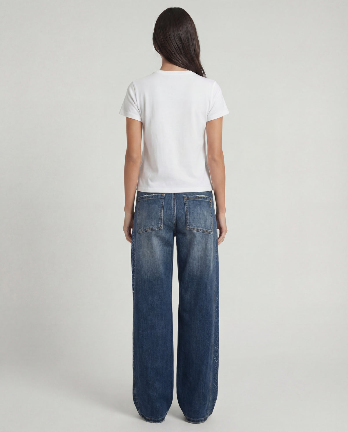 Jeans wide leg con banda laterale decorata