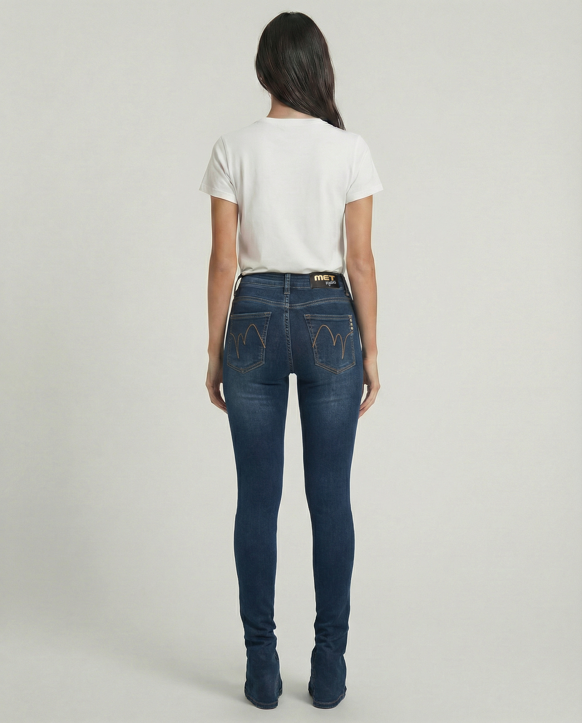 Jeans skinny blu medio con spacchi al fondo