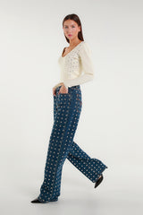 Ivory crop top with V-neck and jewel embellishments