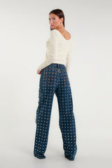 Ivory crop top with V-neck and jewel embellishments