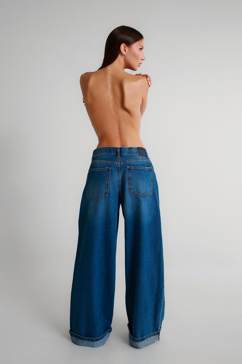 Jeans palazzo blu con risvolto