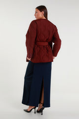 Burgundy quilted jacket with waist belt