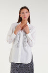 White shirt with jewel embellishments