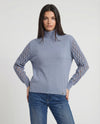 Maglia con collo alto e maniche traforate