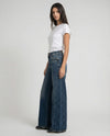 Jeans wide leg con pannelli effetto rigato